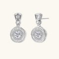 Art Deco-inspired sterling silver drop earrings with tiered moissanite stones in geometric sunburst design